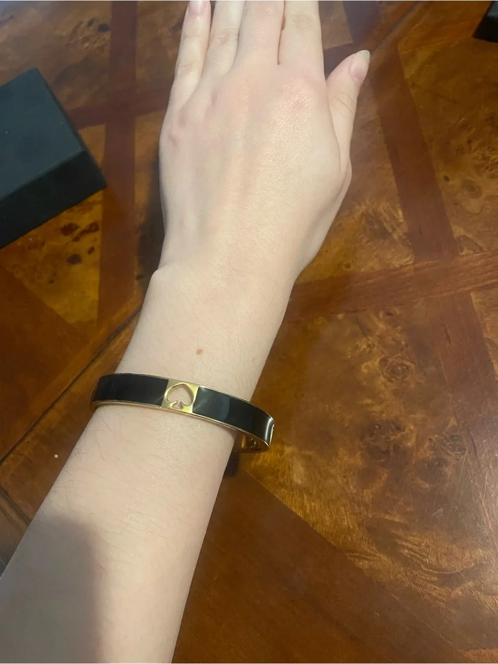 kate spade Hole Punch Gold and Black Enamel Spade Accent Bangle - Picture 2 of 8